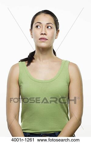 Stock Image - Young woman thinking. Fotosearch