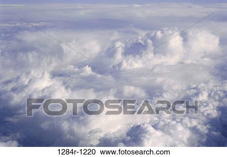 Aerial view of dense clouds in the sky View Large Photo Image Stock Image - Aerial view of dense clouds in the sky. Fotosearch