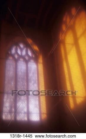 Atmospheric view of diamond leaded church window next to projection onto wall of light from Decorated Gothic window Norfolk UK View Large Photo Image Stock Photography - Atmospheric view of diamond leaded church window next to projection onto wall of light from Decorated Gothic window Norfolk UK. Fotosearch
