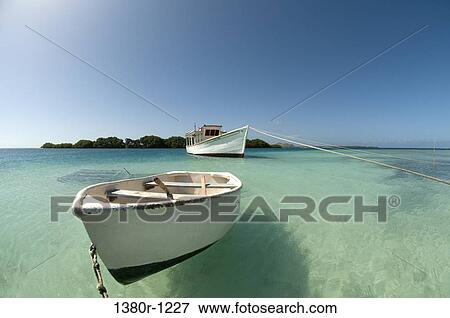 Boats in the sea, Los Roques National Park, Los Roques, Venezuela View Large Photo Image Stock Photo - Boats in the sea, Los Roques National Park, Los Roques, Venezuela. Fotosearch