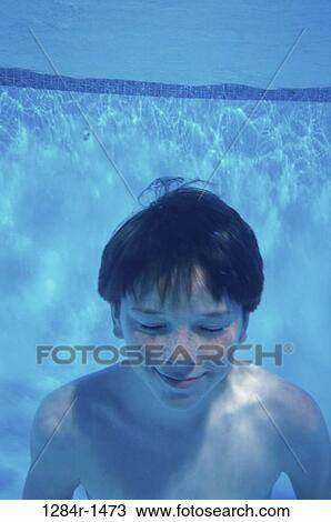 Boy underwater View Large Photo Image Stock Image - Boy underwater. Fotosearch