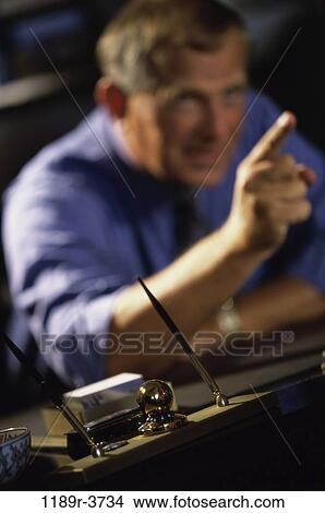 Businessman pointing up View Large Photo Image Picture - Businessman pointing up. Fotosearch