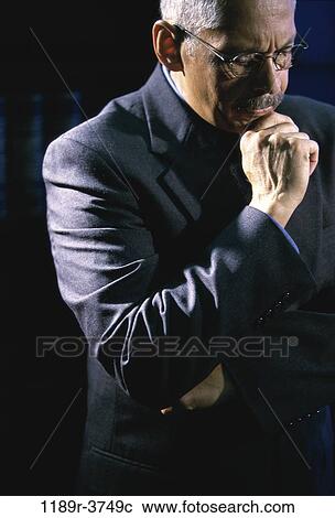 Stock Image - Businessman thinking. Fotosearch