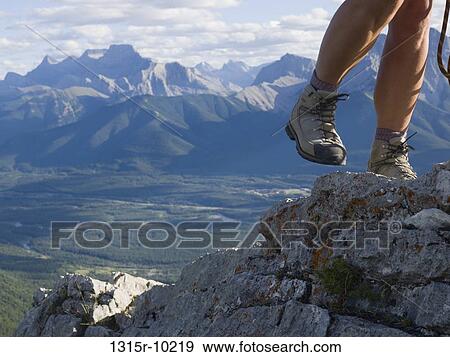 Canada, Alberta, Banff National Park, Hiker's legs ascending rock ridge View Large Photo Image Stock Photo - Canada, Alberta, Banff National Park, Hiker's legs ascending rock ridge. Fotosearch