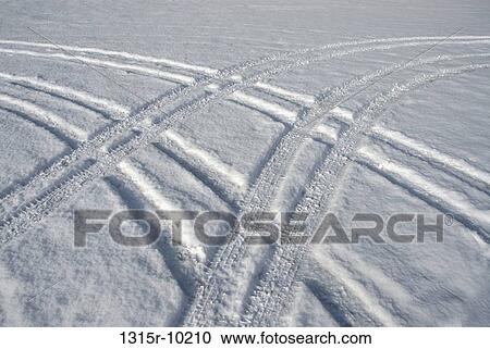 Canada, Alberta, Tire tracks criss-crossing in snow View Large Photo Image Stock Image - Canada, Alberta, Tire tracks criss-crossing in snow. Fotosearch