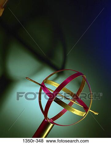 Close-up of a gyroscope View Large Photo Image Stock Photo - Close-up of a gyroscope. Fotosearch