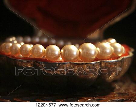 Close-up of a pearl necklace View Large Photo Image Stock Photo - Close-up of a pearl necklace. Fotosearch