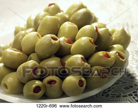 Stock Photograph - Close-up of a plate full of olives. Fotosearch