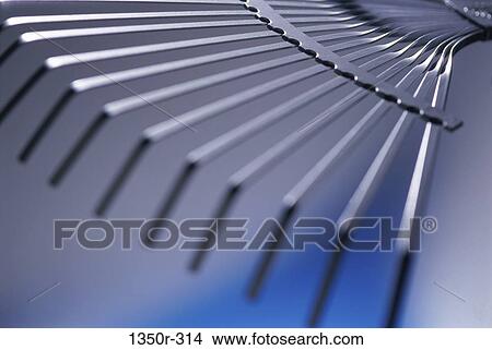 Picture - Close-up of a rake. Fotosearch