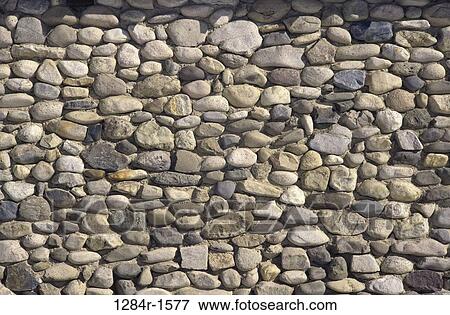 Close-up of a stone wall View Large Photo Image Stock Photo - Close-up of a stone wall. Fotosearch