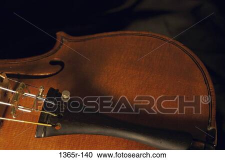 Close-up of a violin View Large Photo Image Stock Image - Close-up of a violin. Fotosearch