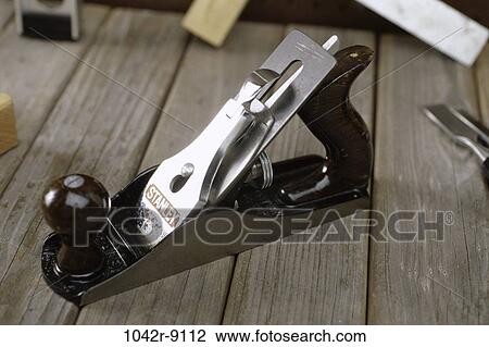 Close-up of a wood planer View Large Photo Image Stock Image - Close-up of a wood planer. Fotosearch