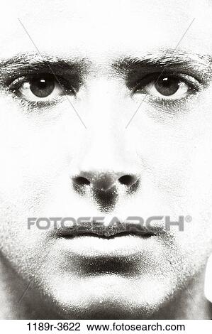 Close-up of a young man's face View Large Photo Image Stock Image - Close-up of a young man's face. Fotosearch
