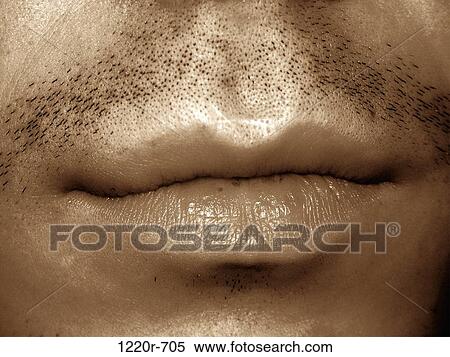 Close-up of a young man's lips View Large Photo Image Stock Photography - Close-up of a young man's lips. Fotosearch