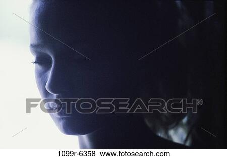 Stock Photo - Close-up of a young woman sleeping. Fotosearch
