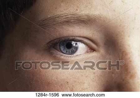 Stock Photograph - Close-up of a young woman's eye. Fotosearch