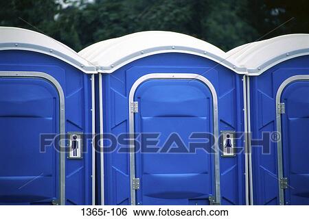 Close-up of an array of portable toilets View Large Photo Image Stock Photograph - Close-up of an array of portable toilets. Fotosearch