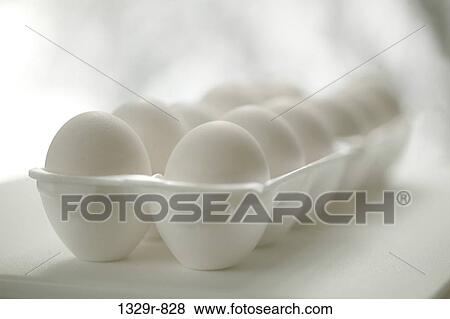 Close-up of eggs in an egg carton View Large Photo Image Stock Photo - Close-up of eggs in an egg carton. Fotosearch
