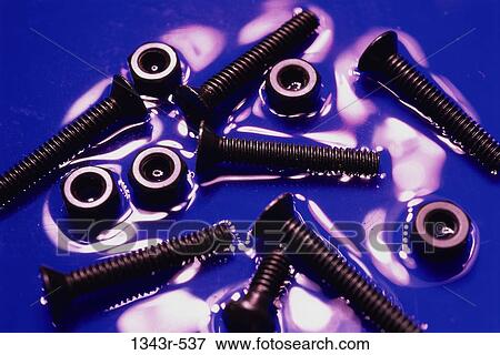 Stock Photo - Close-up of nuts and bolts. Fotosearch