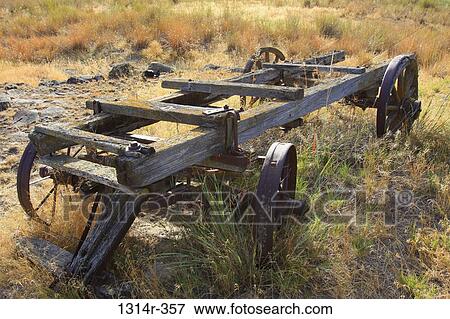 Close up of old wagon in field View Large Photo Image Stock Photo - Close up of old wagon in field. Fotosearch