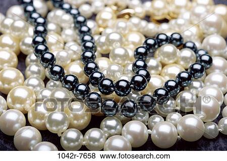 Close-up of pearl necklaces View Large Photo Image Stock Photo - Close-up of pearl necklaces. Fotosearch