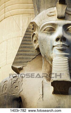 Close up of the Colossal Seated Statue of Ramses II, Luxor Temple, Luxor, Egypt View Large Photo Image Stock Image - Close up of the Colossal Seated Statue of Ramses II, Luxor Temple, Luxor, Egypt. Fotosearch