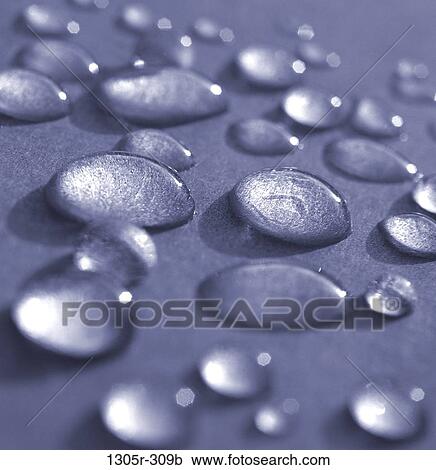 Close-up of water droplets on a surface View Large Photo Image Stock Image - Close-up of water droplets on a surface. Fotosearch
