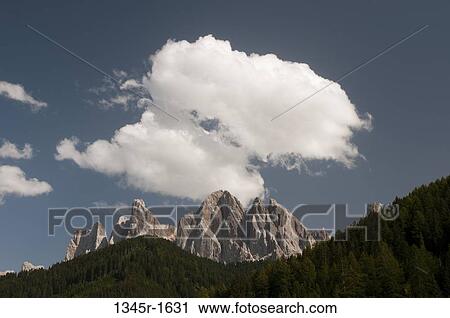 Clouds over mountain range, Geisler Gruppe, Funes Valley, Dolomites, Trentino-Alto-Adige, Italy View Large Photo Image Stock Image - Clouds over mountain range, Geisler Gruppe, Funes Valley, Dolomites, Trentino-Alto-Adige, Italy. Fotosearch