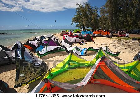Colorfull surf kites and kite surfers at Kite Beach, Kanaha, Maui, Hawaii View Large Photo Image Stock Photography - Colorfull surf kites and kite surfers at Kite Beach, Kanaha, Maui, Hawaii. Fotosearch