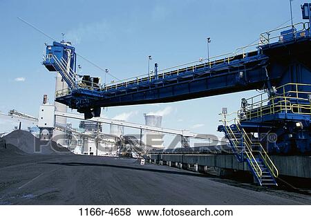 Stock Photo - Conveyor belt at a power plant. Fotosearch