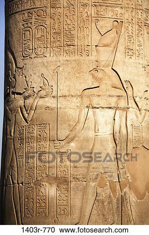Depiction of the god Horus on a column at the ancient ruins of Kom Ombo on the Nile River in southern Egypt View Large Photo Image Stock Image - Depiction of the god Horus on a column at the ancient ruins of Kom Ombo on the Nile River in southern Egypt. Fotosearch
