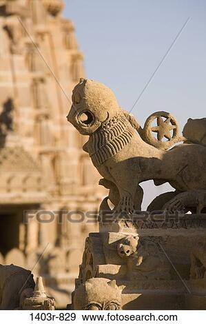 Detail of a carved statue outside the Jain Temple at Jaisalmer Fort, Rajasthan, India View Large Photo Image Stock Photo - Detail of a carved statue outside the Jain Temple at Jaisalmer Fort, Rajasthan, India. Fotosearch