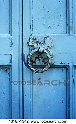 Stock Image - Detail of a wooden door. Fotosearch