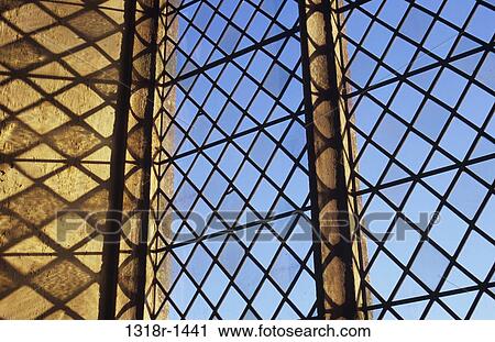 Detail of diamond-leaded window set in carved sandstone and casting shadows of flawed handmade glass Norfolk UK View Large Photo Image Stock Image - Detail of diamond-leaded window set in carved sandstone and casting shadows of flawed handmade glass Norfolk UK. Fotosearch