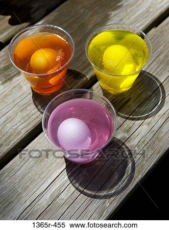 Dying of easter eggs on picnic table View Large Photo Image Stock Photography - Dying of easter eggs on picnic table. Fotosearch