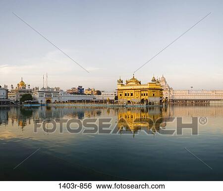 Evening light at the Sikh Golden Temple in Amritsar, India in Punjab state View Large Photo Image Stock Photograph - Evening light at the Sikh Golden Temple in Amritsar, India in Punjab state. Fotosearch