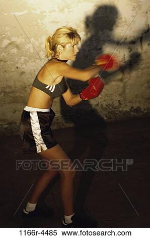 Female boxer practicing View Large Photo Image Stock Photography - Female boxer practicing. Fotosearch