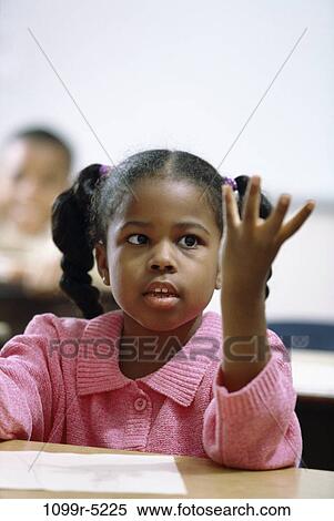 Girl counting on her fingers View Large Photo Image Stock Photography - Girl counting on her fingers. Fotosearch
