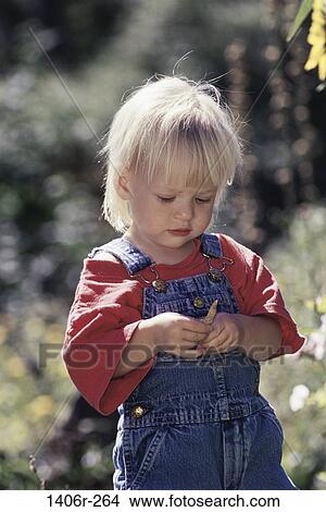 Picture - Girl looking down. Fotosearch