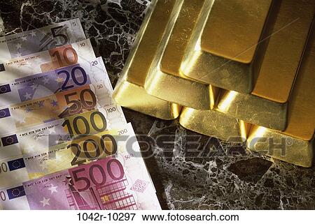 Gold bars next to euro banknotes View Large Photo Image Stock Photo - Gold bars next to euro banknotes. Fotosearch