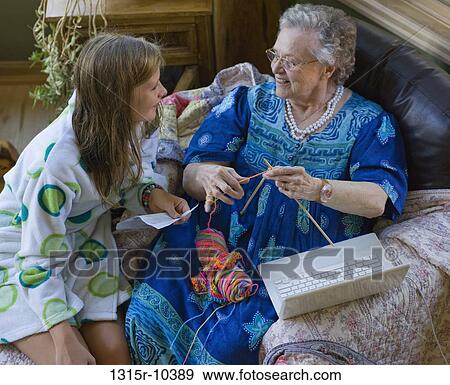 Grandmother teaching teenage girl how to knit View Large Photo Image Stock Photo - Grandmother teaching teenage girl how to knit. Fotosearch