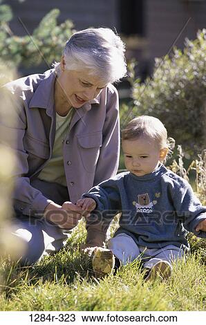 Grandmother with her grandson View Large Photo Image Stock Image - Grandmother with her grandson. Fotosearch