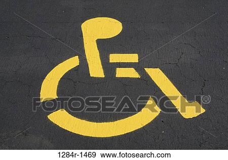 Handicapped sign painted on a road View Large Photo Image Stock Photo - Handicapped sign painted on a road. Fotosearch