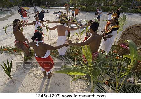 High angle view of a group of people dancing in a traditional wedding ceremony on the beach, Pearl Beach Resort, Bora Bora, French Polynesia View Large Photo Image Stock Photo - High angle view of a group of people dancing in a traditional wedding ceremony on the beach, Pearl Beach Resort, Bora Bora, French Polynesia. Fotosearch