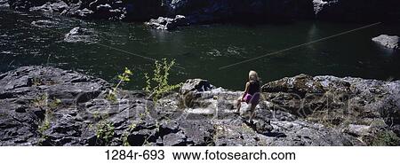 High angle view of a person standing near a river, Rouge River, Oregon, USA View Large Photo Image Stock Image - High angle view of a person standing near a river, Rouge River, Oregon, USA. Fotosearch