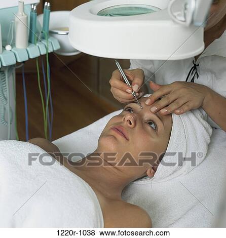 High angle view of a young woman getting a spa treatment View Large Photo Image Stock Photo - High angle view of a young woman getting a spa treatment. Fotosearch