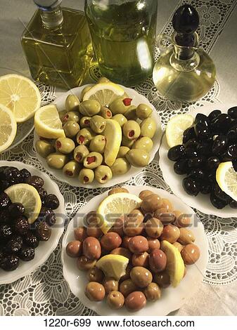 High angle view of assorted olives in plates View Large Photo Image Stock Photo - High angle view of assorted olives in plates. Fotosearch
