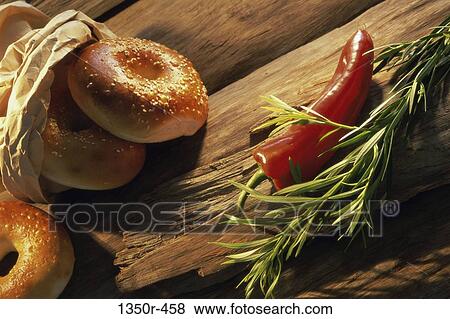 High angle view of bagels and chili peppers View Large Photo Image Stock Photo - High angle view of bagels and chili peppers. Fotosearch