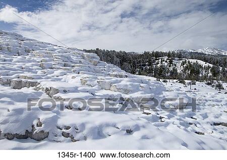 Hot spring covered with snow, Mammoth Hot Springs, Yellowstone National Park, Wyoming, USA View Large Photo Image Stock Image - Hot spring covered with snow, Mammoth Hot Springs, Yellowstone National Park, Wyoming, USA. Fotosearch