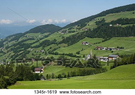 Stock Photo - Houses on a landscape, Santa Maddalena, Funes Valley, Dolomites, Trentino-Alto-Adige, Italy. Fotosearch